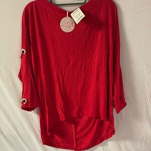 Woman’s red long sleeve top